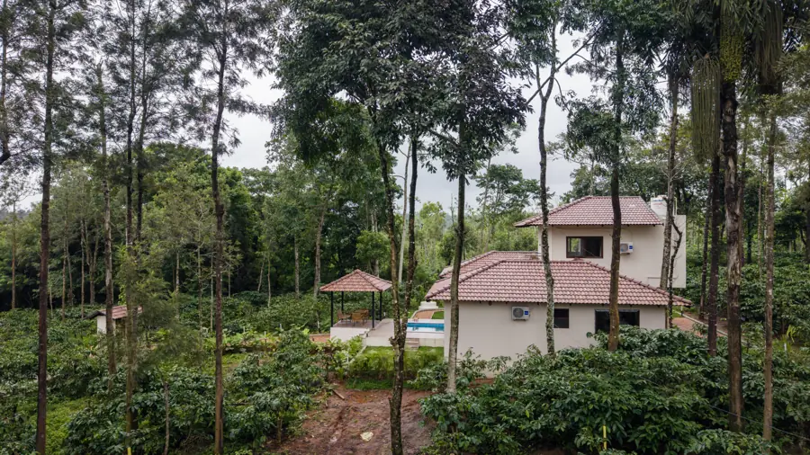 Wide view of the estate with the house and gazebo